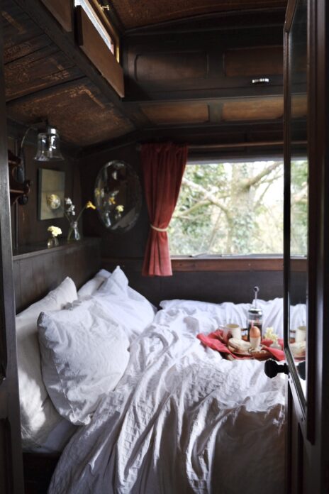 Bedroom of wagon with breakfast tray
