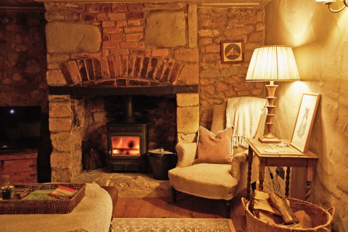 Fireplace and armchair at The Dorset Nook, Dorset