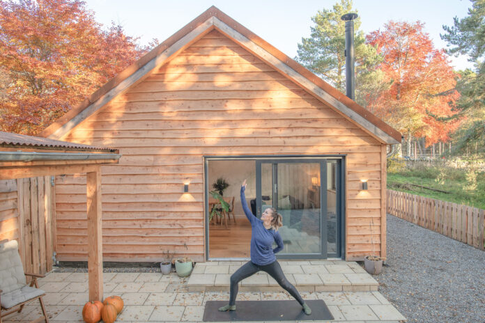 Yoga outside at Cairngorms Cabin